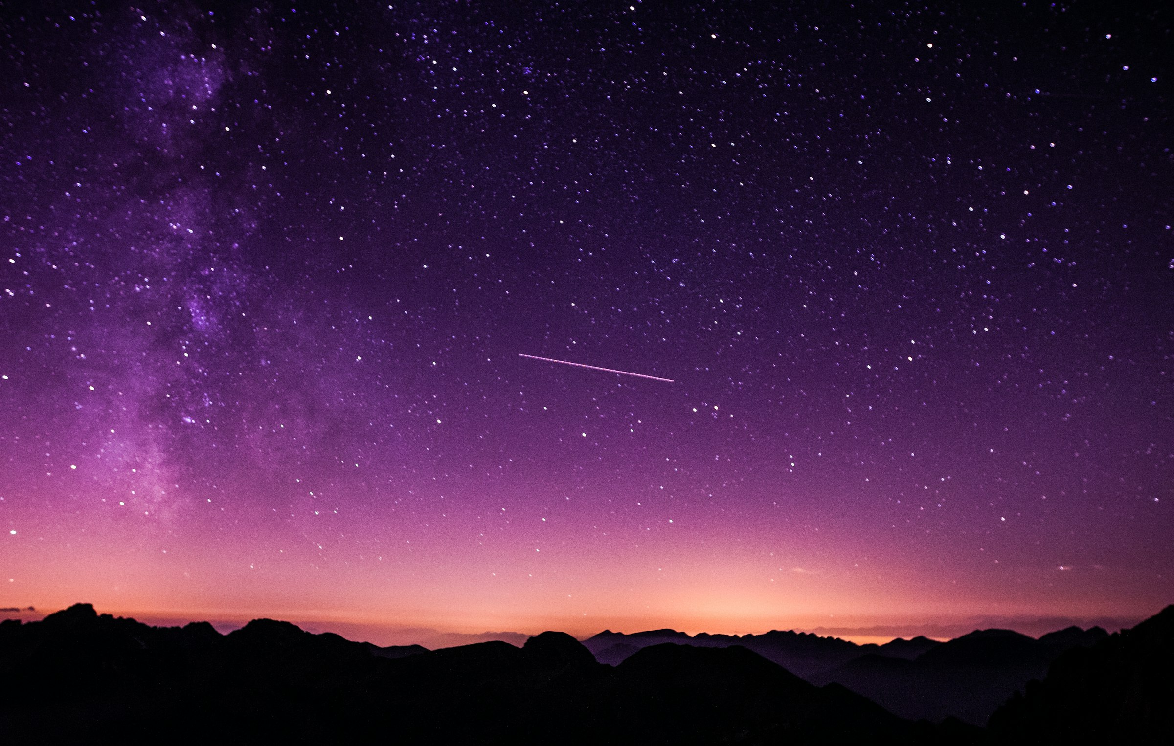 The Milky Way over a ridge line