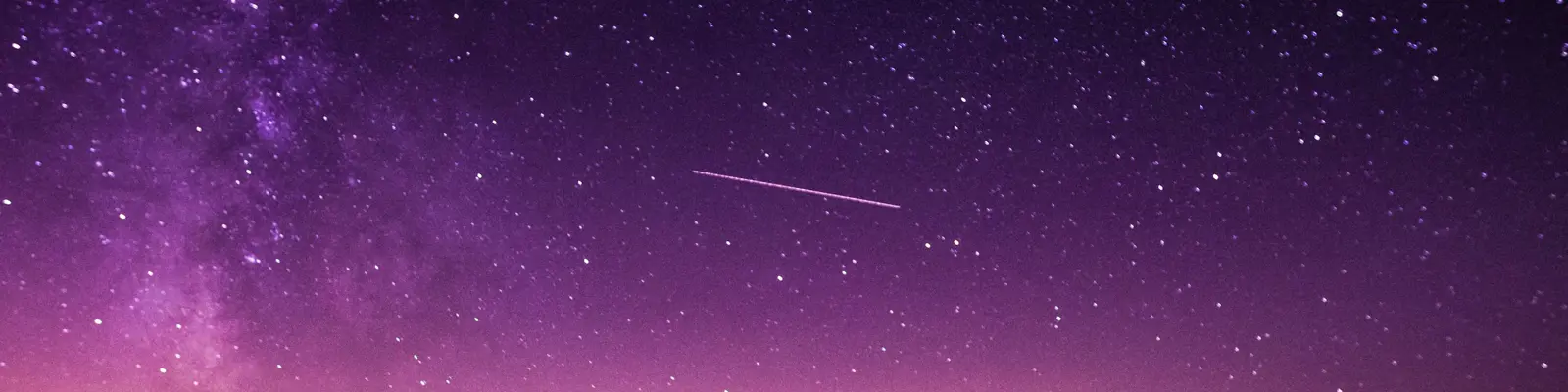The Milky Way over a ridge line